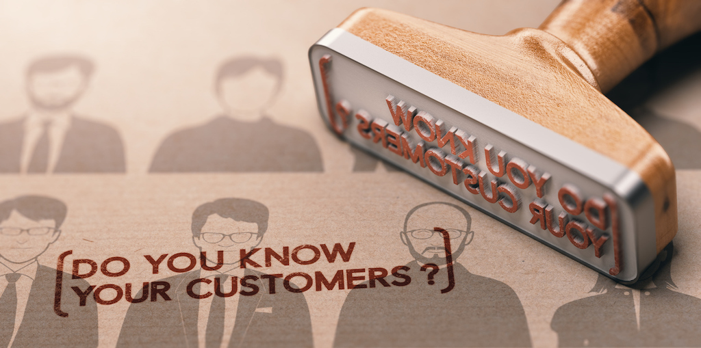 wooden stamp, says do you know your customers?